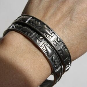 Set of 2 Vintage Silvertone bangles Textured embossed Tribal Ethnic unisex